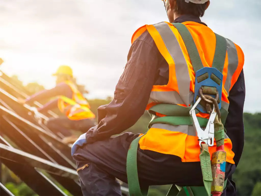 Worker wearing full safety gear on site